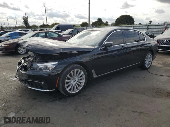 2018 BMW 7 Series 740i with VIN WBA7E2C59JB216290, listed as a Copart auction lot 89082215 with 56,020 mi miles and Salvage Title. Bid and sale history available at carsss.com. Image 1.
