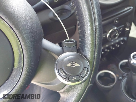 2013 MINI Hardtop S with VIN WMWSV3C54DT476756, listed as a IAAI auction lot 42691529 with 130,877 mi miles and . Bid and sale history available at DreamBid. Image 11.