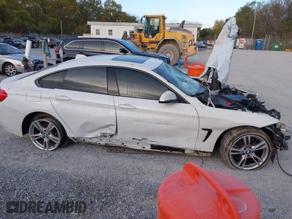 2015 BMW 4 Series 428i xDrive z VIN WBA4C9C57FD330866, wystawiony jako IAAI lot #40574326 z przebiegiem 123 726 mil mil oraz . Historia ofert i sprzedaży dostępna na DreamBid. Obrazek 13.