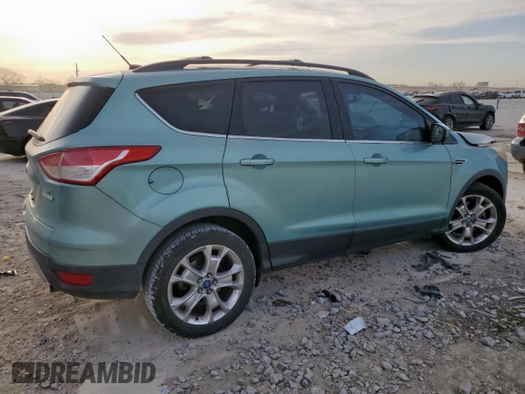 2013 Ford Escape SE with VIN 1FMCU0G97DUC34491, listed as a Copart auction lot 50516525 with 133,764 mi miles and Salvage title. Bid and sale history available at DreamBid. Image 3.