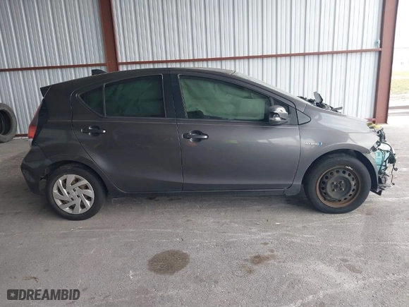 2015 Toyota Prius c One with VIN JTDKDTB38F1115180, listed as a IAAI auction lot 41875654 with 227,356 mi miles. Bid and sale history available at carsss.com. Image 13.