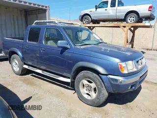 2000 Nissan Frontier XE with VIN 1N6ED27TXYC378601, listed as a IAAI auction lot 42690648 with 216,829 mi miles and . Bid and sale history available at DreamBid. Image 1.