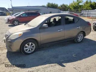 2012 Nissan Versa SV with VIN 3N1CN7AP1CL812288, listed as a Copart auction lot 63996355 with 128,229 mi miles and Clean title. Bid and sale history available at DreamBid. Image 1.