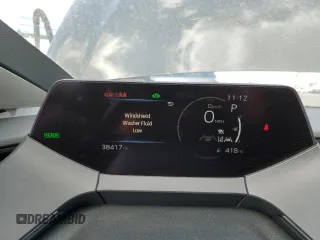 2023 Toyota Prius LE z VIN JTDACAAUXP3005928, wystawiony jako Copart lot #56358905 z przebiegiem 38 417 mil mil oraz Szkoda całkowita • Salvage title. Historia ofert i sprzedaży dostępna na DreamBid. Obrazek 9.