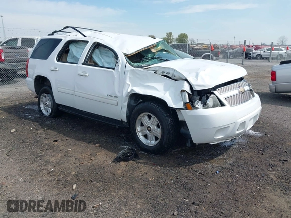 2011 Chevrolet Tahoe LS with VIN 1GNSCAE09BR352496, listed as a IAAI auction lot 41888764 with 234,311 mi miles and . Bid and sale history available at DreamBid. Image 1.