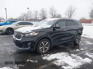 2019 Kia Sorento EX with VIN 5XYPHDA57KG452677, listed as a IAAI auction lot 41362615 with 100,580 mi miles and . Bid and sale history available at DreamBid. Image 2.