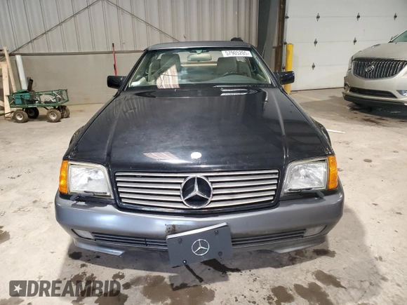 1992 Mercedes-Benz 500 z VIN WDBFA66E5NF040865, wystawiony jako Copart lot #57905205 z przebiegiem 95 158 mil mil oraz Tytuł czysty. Historia ofert i sprzedaży dostępna na DreamBid. Obrazek 5.