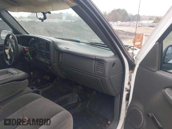 2005 Chevrolet Silverado 1500 with VIN 1GCEK19V65E152928, listed as a IAAI auction lot 41485115 with 165,560 mi miles. Bid and sale history available at carsss.com. Image 5.