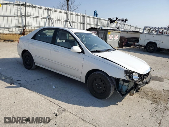 2009 Kia Spectra EX with VIN KNAFE221295654167, listed as a Copart auction lot 53377745 with 131,266 mi miles and Salvage Title. Bid and sale history available at DreamBid. Image 4.