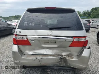 2006 Honda Odyssey Touring z VIN 5FNRL38886B000011, wystawiony jako Copart lot #57399225 z przebiegiem 256 217 mil mil oraz Szkoda całkowita • Salvage title. Historia ofert i sprzedaży dostępna na DreamBid. Obrazek 6.