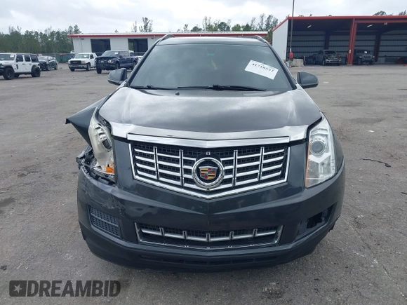 2015 Cadillac SRX with VIN 3GYFNAE30FS569009, listed as a IAAI auction lot 41718522 with 104,448 mi miles and . Bid and sale history available at DreamBid. Image 12.