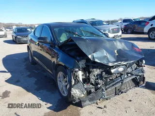 2011 Kia Optima LX with VIN KNAGM4A7XB5133681, listed as a IAAI auction lot 41602973 with 210,615 mi miles and . Bid and sale history available at carsss.com. Image 1.