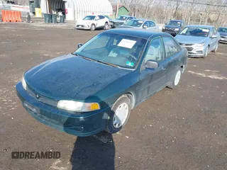 2001 Mitsubishi Mirage ES z VIN JA3AY26C91U041410, wystawiony jako IAAI lot #41360183 z przebiegiem 322 178 mil mil oraz . Historia ofert i sprzedaży dostępna na DreamBid. Obrazek 2.