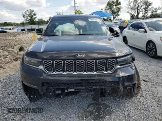 2023 Jeep Grand Cherokee Summit Reserve with VIN 1C4RJKEG5P8853916, listed as a Copart auction lot 52691735 with 18,899 mi miles and Salvage title. Bid and sale history available at DreamBid. Image 5.