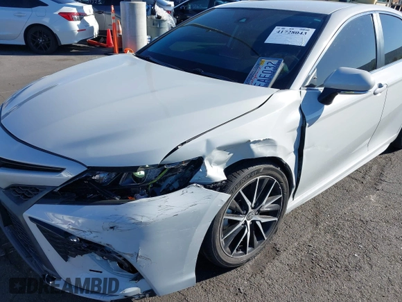 2023 Toyota Camry SE with VIN 4T1T11AK5PU117331, listed as a IAAI auction lot 41728043 with 13,019 mi miles and . Bid and sale history available at DreamBid. Image 6.