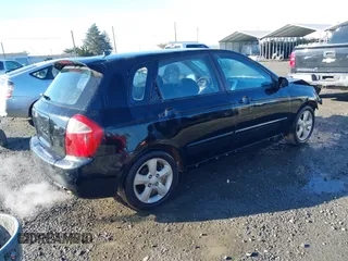 2008 Kia Spectra with VIN KNAFE162485017888, listed as a IAAI auction lot 41334351 with 195,280 mi miles. Bid and sale history available at carsss.com. Image 4.