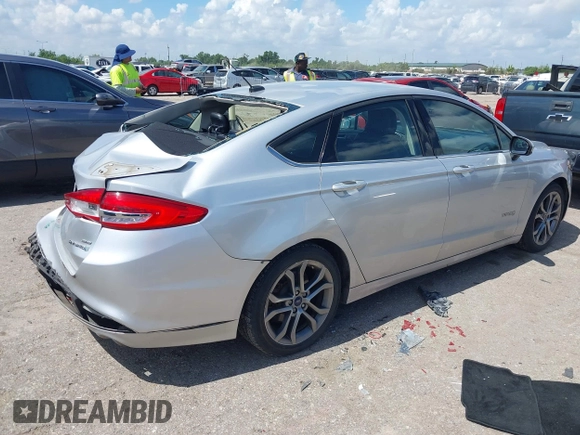 2017 Ford Fusion Hybrid SE with VIN 3FA6P0LU4HR234101, listed as a IAAI auction lot 42579447 with 169,273 mi miles and . Bid and sale history available at DreamBid. Image 4.