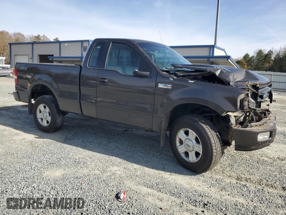 2005 Ford F-150 XL with VIN 1FTRF14W65NB91606, listed as a Copart auction lot 84889894 with 157,947 mi miles and Salvage Title. Bid and sale history available at carsss.com. Image 4.