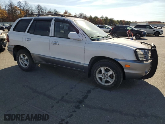 2002 Hyundai Santa Fe GLS with VIN KM8SC13D42U162953, listed as a Copart auction lot 77953044 with 98,463 mi miles and Clean Title. Bid and sale history available at carsss.com. Image 4.