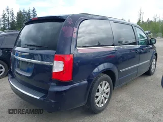 2014 Chrysler Town & Country Touring with VIN 2C4RC1BG0ER211050, listed as a IAAI auction lot 42086523 with 131,434 mi miles. Bid and sale history available at carsss.com. Image 4.