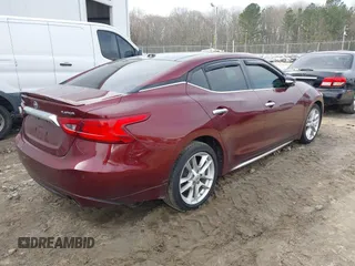 2016 Nissan Maxima SL with VIN 1N4AA6AP0GC396719, listed as a IAAI auction lot 41783950 with 210,850 mi miles and . Bid and sale history available at DreamBid. Image 4.