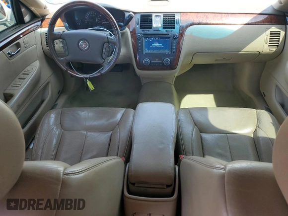 2006 Cadillac DTS 1SB z VIN 1G6KD57Y36U144765, wystawiony jako Copart lot #50603475 z przebiegiem 105 637 mil mil oraz Czysty tytuł • Clean title. Historia ofert i sprzedaży dostępna na DreamBid. Obrazek 8.