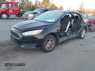 2017 Ford Focus SE with VIN 1FADP3FE7HL298287, listed as a IAAI auction lot 41870698 with Not Provided miles and . Bid and sale history available at carsss.com. Image 2.