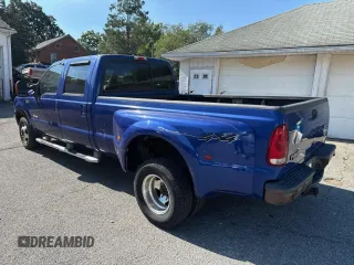 2003 Ford F-350 XL with VIN 1FTWW33P23EC02154, listed as a Copart auction lot 74262214 with 260,336 mi miles and Clean Title. Bid and sale history available at DreamBid. Image 3.