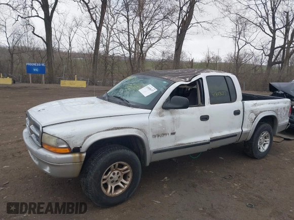 2002 Dodge Dakota SLT z VIN 1B7HG48N72S577296, wystawiony jako IAAI lot #41848637 z przebiegiem 133 777 mil mil oraz . Historia ofert i sprzedaży dostępna na DreamBid. Obrazek 6.