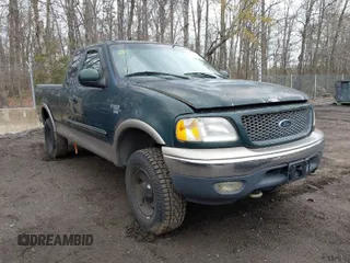 2001 Ford F-150 XL with VIN 1FTRX18LX1NA33311, listed as a IAAI auction lot 41940094 with 202,534 mi miles. Bid and sale history available at carsss.com. Image 1.