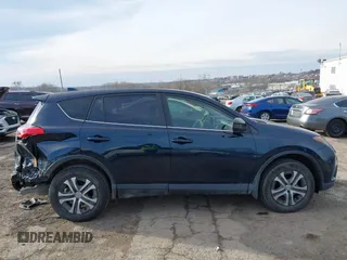 2018 Toyota RAV4 LE with VIN JTMBFREV5JD253342, listed as a IAAI auction lot 41656581 with 243,791 mi miles and . Bid and sale history available at DreamBid. Image 14.