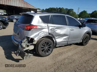 2018 Toyota RAV4 XLE with VIN 2T3RFREV5JW731373, listed as a Copart auction lot 51917465 with 124,623 mi miles and Salvage Title. Bid and sale history available at DreamBid. Image 3.