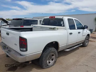 2002 Dodge 1500 with VIN 1D7HU18Z82S576903, listed as a IAAI auction lot 42125464 with 215,479 mi miles. Bid and sale history available at carsss.com. Image 4.