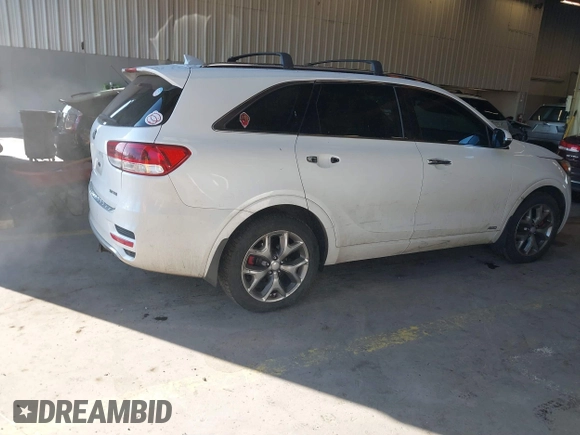 2016 Kia Sorento SX with VIN 5XYPKDA51GG183763, listed as a IAAI auction lot 41513849 with 164,269 mi miles. Bid and sale history available at carsss.com. Image 4.