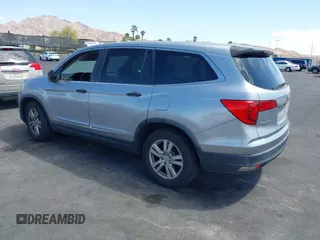 2016 Honda Pilot LX with VIN 5FNYF5H10GB044006, listed as a IAAI auction lot 42075404 with 129,642 mi miles and . Bid and sale history available at DreamBid. Image 3.