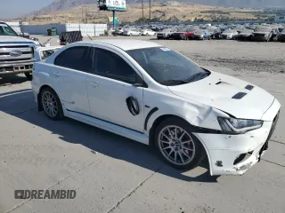 2015 Mitsubishi Lancer Evolution GSR with VIN JA32W8FV4FU024603, listed as a Copart auction lot 74699914 with 81,311 mi miles and Salvage Title. Bid and sale history available at carsss.com. Image 4.