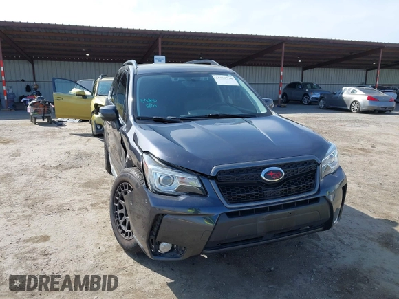 2018 Subaru Forester Touring with VIN JF2SJGWCXJH601162, listed as a IAAI auction lot 41760750 with 69,655 mi miles. Bid and sale history available at carsss.com. Image 6.