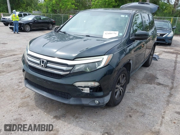 2017 Honda Pilot EX-L with VIN 5FNYF6H50HB033968, listed as a IAAI auction lot 42400720 with 119,597 mi miles and . Bid and sale history available at DreamBid. Image 6.