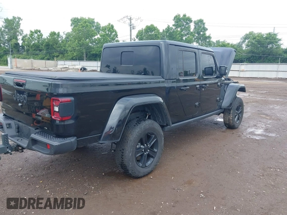2023 Jeep Gladiator Overland with VIN 1C6JJTFM9PL593659, listed as a IAAI auction lot 42470253 with 34,374 mi miles and . Bid and sale history available at DreamBid. Image 4.