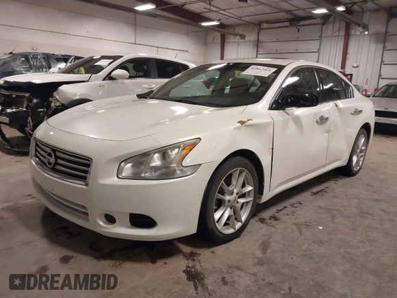 2014 Nissan Maxima S with VIN 1N4AA5AP1EC439827, listed as a IAAI auction lot 41847464 with 135,205 mi miles and . Bid and sale history available at DreamBid. Image 2.