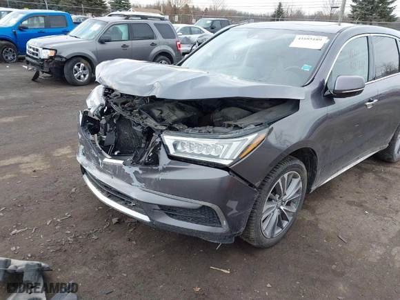 2017 Acura MDX w/Technology Pkg with VIN 5FRYD4H55HB010999, listed as a IAAI auction lot 41685189 with 156,601 mi miles. Bid and sale history available at carsss.com. Image 2.
