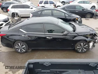 2021 Nissan Altima SV with VIN 1N4BL4DV0MN391243, listed as a IAAI auction lot 42047627 with 102,717 mi miles and . Bid and sale history available at carsss.com. Image 14.