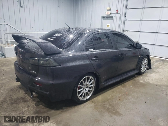 2014 Mitsubishi Lancer Evolution GSR with VIN JA32W8FV5EU017979, listed as a Copart auction lot 47222615 with 109,632 mi miles and Salvage Title. Bid and sale history available at carsss.com. Image 3.