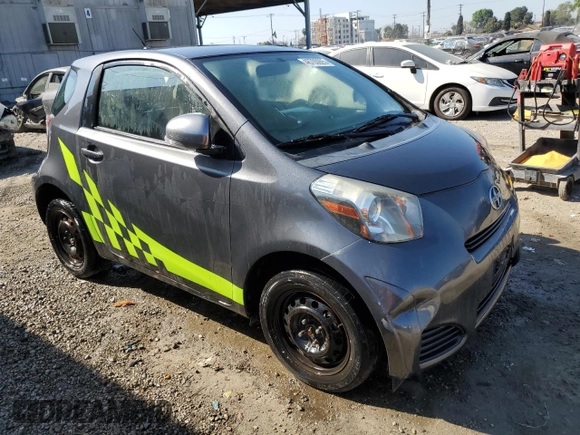 2014 Scion iQ with VIN JTNJJXB0XEJ029610, listed as a Copart auction lot 46700905 with 135,381 mi miles and Salvage title. Bid and sale history available at DreamBid. Image 4.