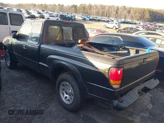 2002 Mazda B-Series 2WD Truck DS with VIN 4F4YR16U62TM20251, listed as a IAAI auction lot 41279080 with 302,481 mi miles. Bid and sale history available at carsss.com. Image 3.
