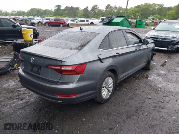 2019 Volkswagen Jetta S z VIN 3VWC57BU7KM232096, wystawiony jako IAAI lot #42317927 z przebiegiem 98 615 mil mil oraz . Historia ofert i sprzedaży dostępna na DreamBid. Obrazek 4.