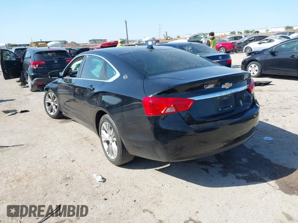 2014 Chevrolet Impala LT with VIN 2G1125S3XE9296363, listed as a IAAI auction lot 41999183 with 206,740 mi miles and . Bid and sale history available at DreamBid. Image 3.