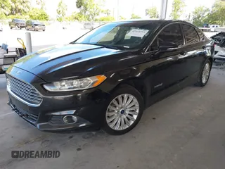 2015 Ford Fusion SE Hybrid with VIN 3FA6P0LU5FR102185, listed as a IAAI auction lot 42453553 with 172,230 mi miles and . Bid and sale history available at DreamBid. Image 2.