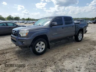 2015 Toyota Tacoma PreRunner with VIN 5TFJU4GN9FX090136, listed as a Copart auction lot 64244485 with 117,930 mi miles and Salvage title. Bid and sale history available at DreamBid. Image 1.