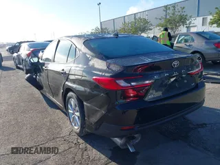 2025 Toyota Camry LE with VIN 4T1DAACKXSU576221, listed as a IAAI auction lot 41548642 with Not Provided miles and . Bid and sale history available at DreamBid. Image 3.